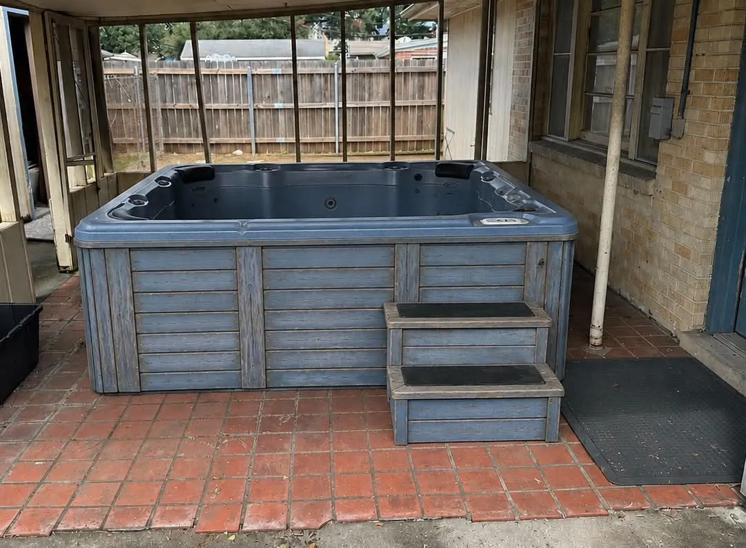 Hot tub in a screened porch